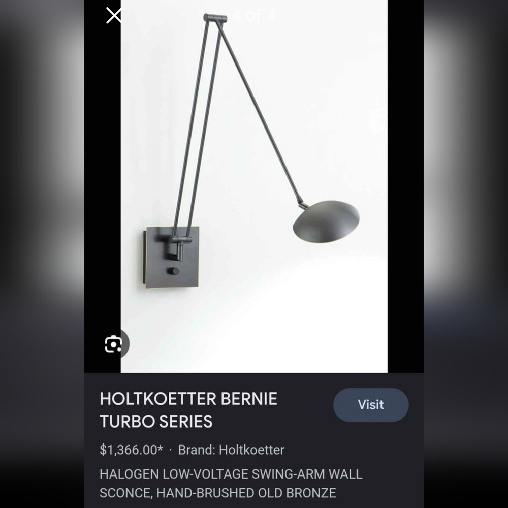 Swing arm wall sconce